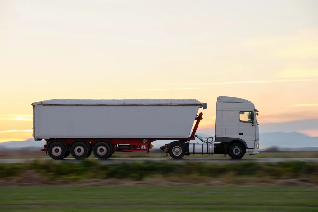 semi truck with tipping cargo trailer transporting 2024 12 06 03 27 25 utc